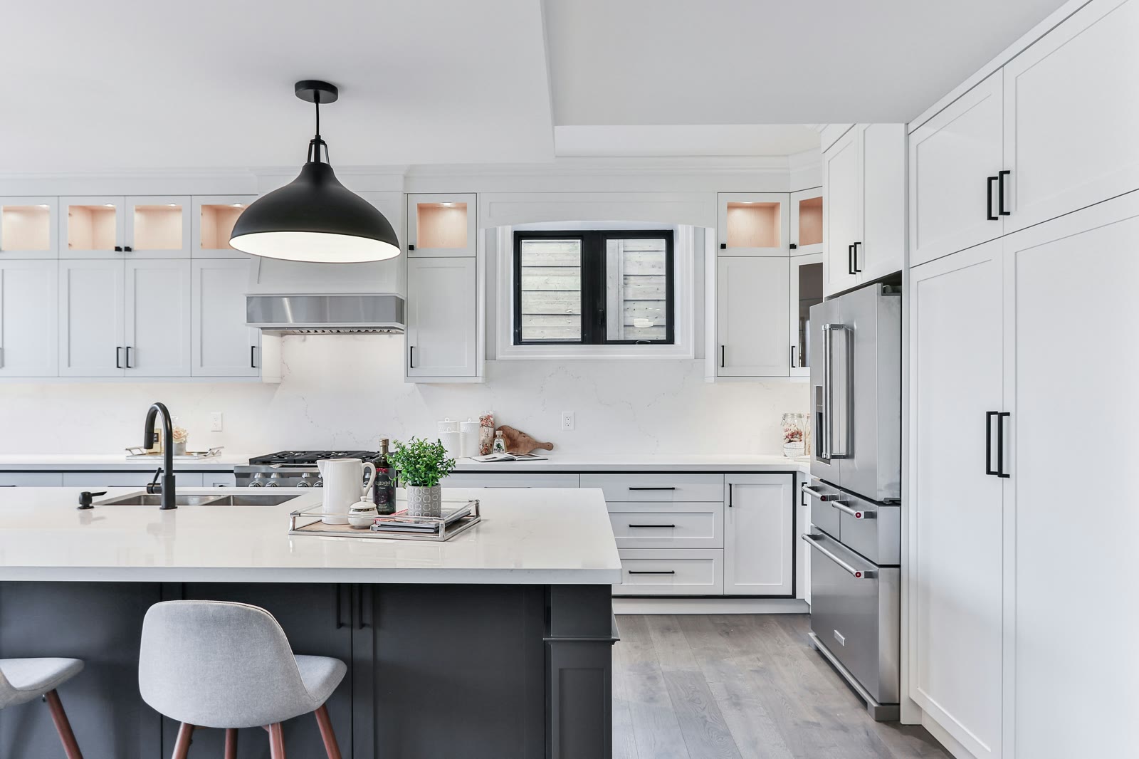 Existing white kitchen with wall and floor cabinets ready for an organization reset